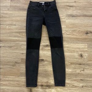 Faded black jeans with black patches at knees!